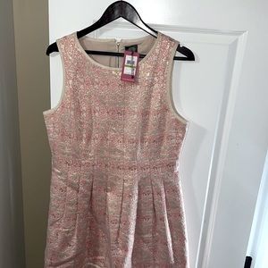 Beautiful unworn dress for any dressy occasion!